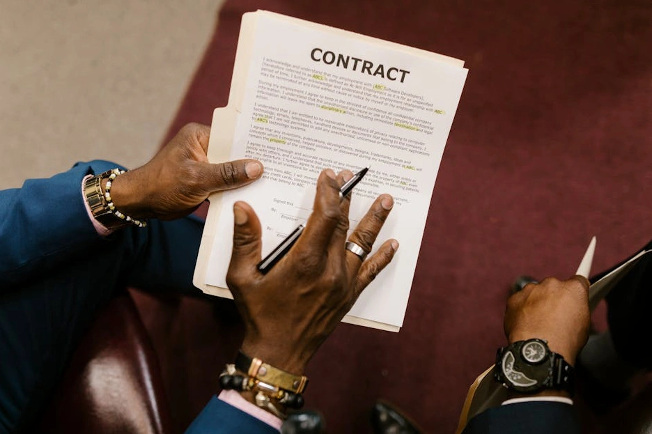 A lawyer reviewing legal documents at a desk
